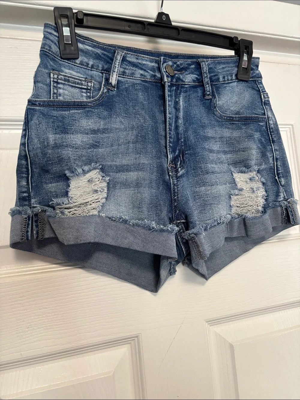 Distressed Blue denim shorts